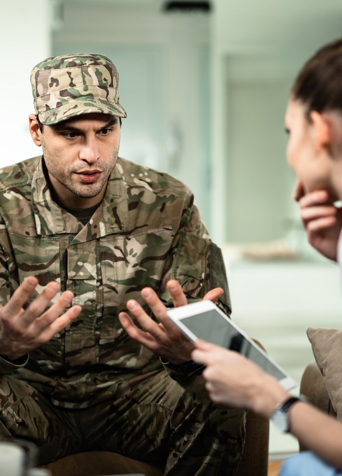 Taking notes from soldier